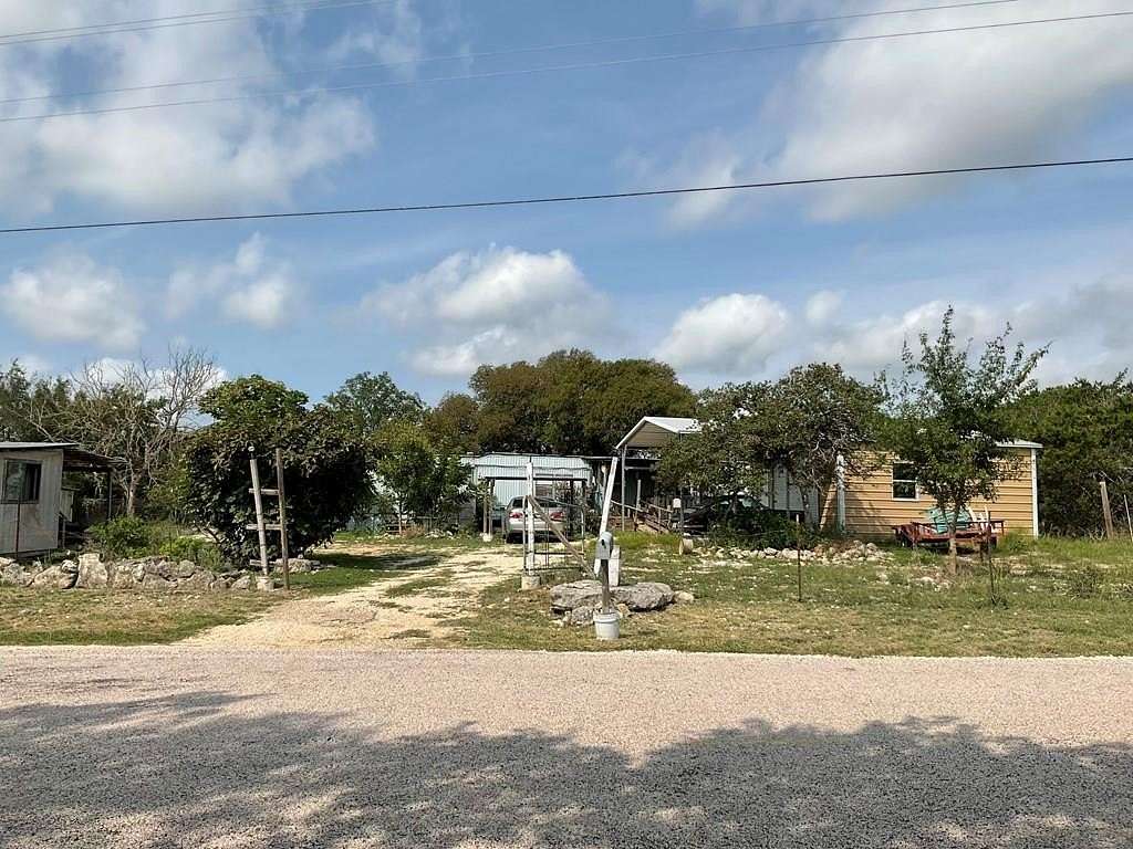 5.17 Acres of Residential Land with Home for Sale in Center Point, Texas