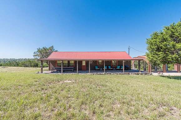 14.973 Acres of Land with Home for Sale in Fredericksburg, Texas