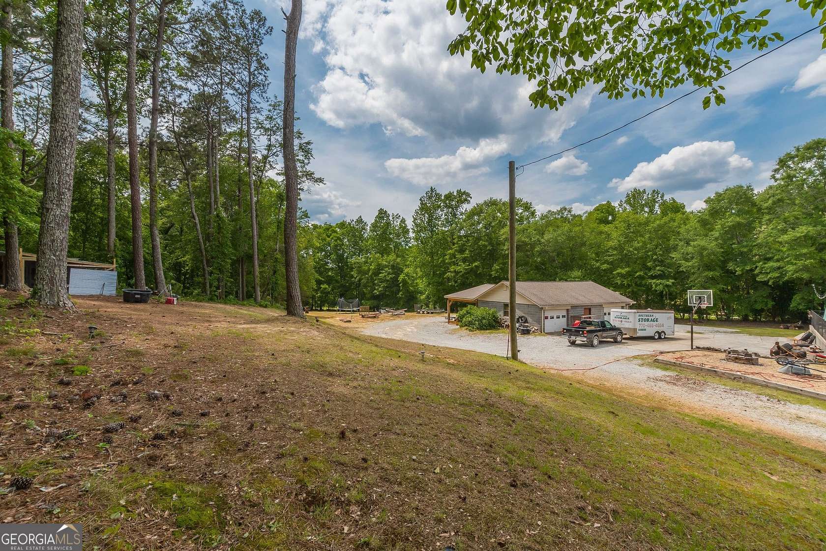 5 Acres of Residential Land with Home for Sale in Loganville, Georgia