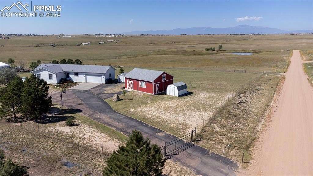 2.5 Acres of Residential Land with Home for Sale in Peyton, Colorado