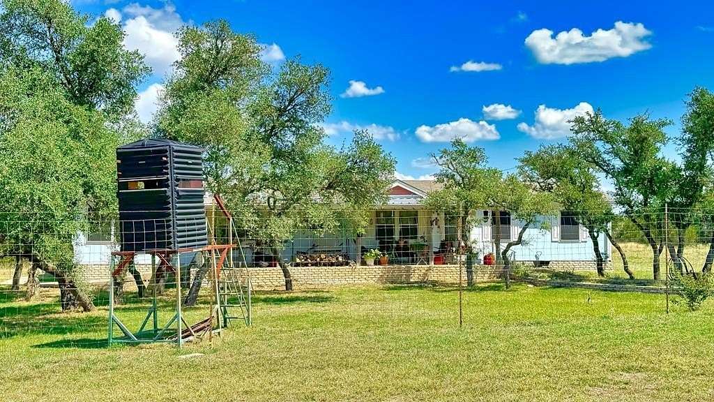 60 Acres of Recreational Land with Home for Sale in Mountain Home, Texas