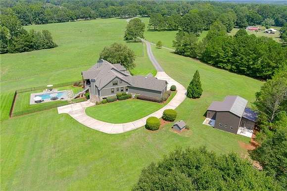 84 Acres of Land with Home for Sale in Grantville, Georgia