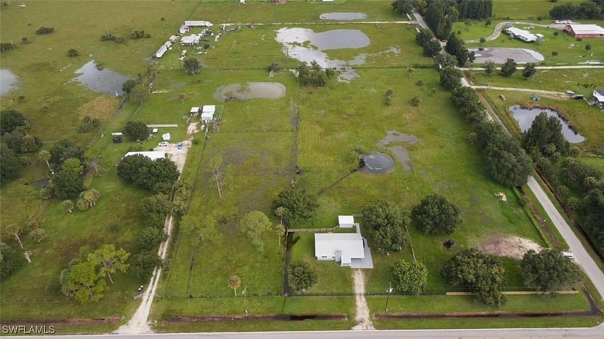 4.29 Acres of Residential Land with Home for Sale in Fort Denaud, Florida