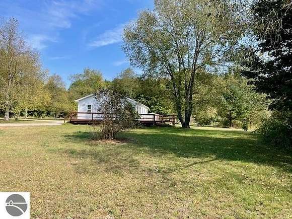 5 Acres of Residential Land with Home for Sale in Thompsonville, Michigan