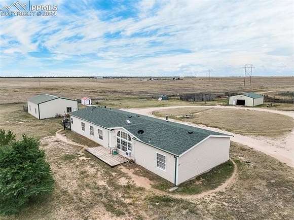 40 Acres of Agricultural Land with Home for Sale in Yoder, Colorado