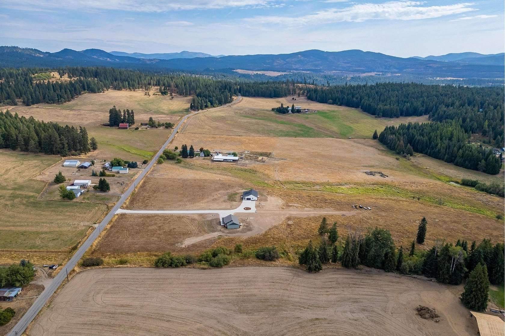 5 Acres of Residential Land with Home for Sale in Elk, Washington