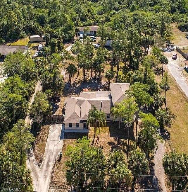 2.27 Acres of Residential Land with Home for Sale in Naples, Florida