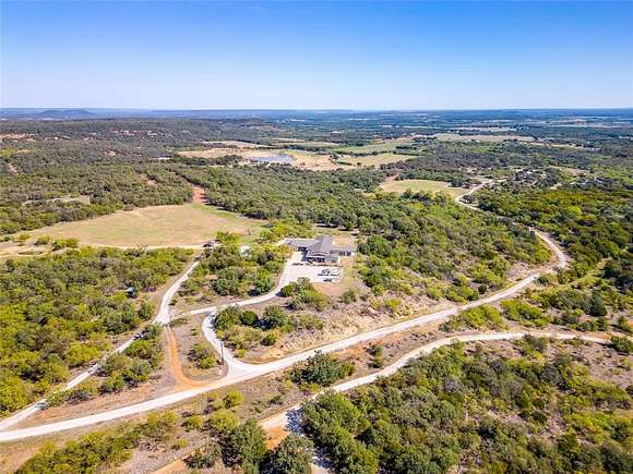 11 Acres of Land with Home for Sale in Mingus, Texas