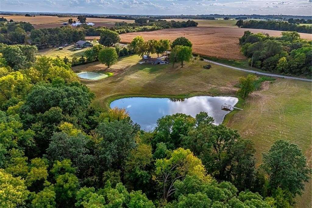 20 Acres of Recreational Land with Home for Sale in Oak Grove, Missouri