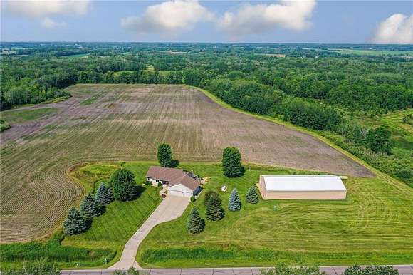 80 Acres of Agricultural Land with Home for Sale in Oak Park, Minnesota