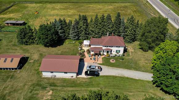 34.35 Acres of Agricultural Land with Home for Sale in Manistique, Michigan