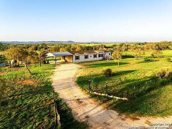 2.465 Acres of Residential Land with Home for Sale in Comfort, Texas