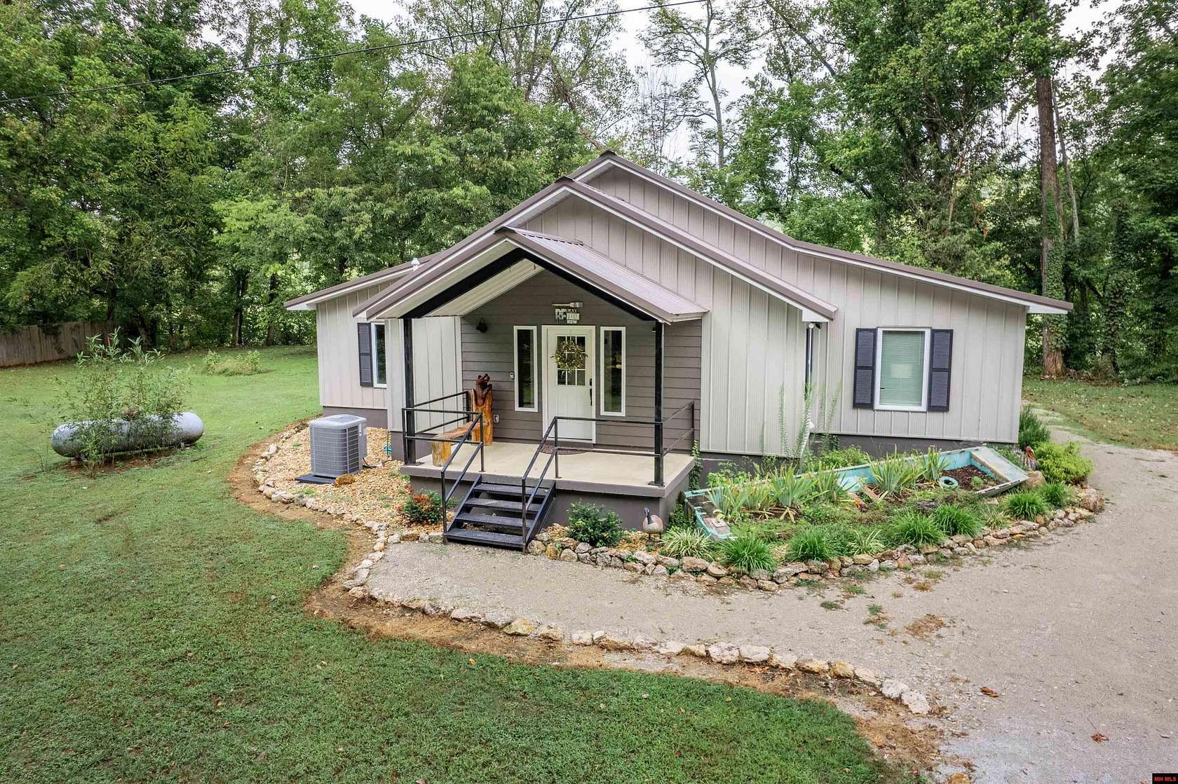 8.77 Acres of Land with Home for Sale in Norfork, Arkansas