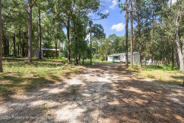 2.2 Acres of Residential Land with Home for Sale in Brooksville, Florida
