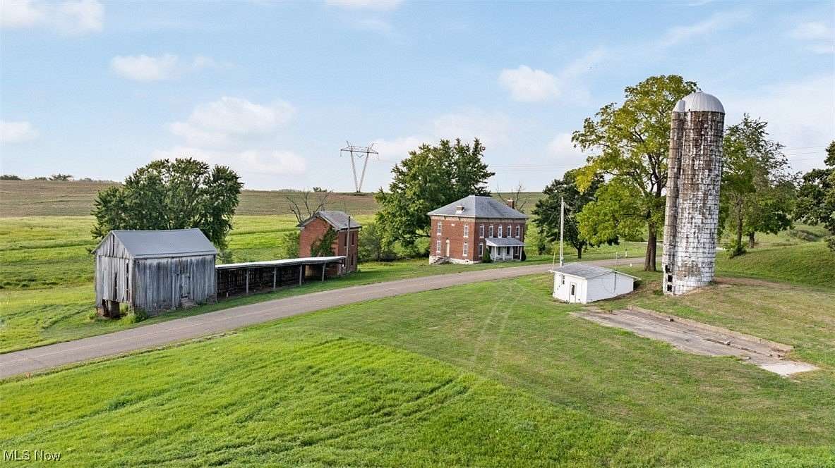 13.7 Acres of Land with Home for Auction in Carrollton, Ohio