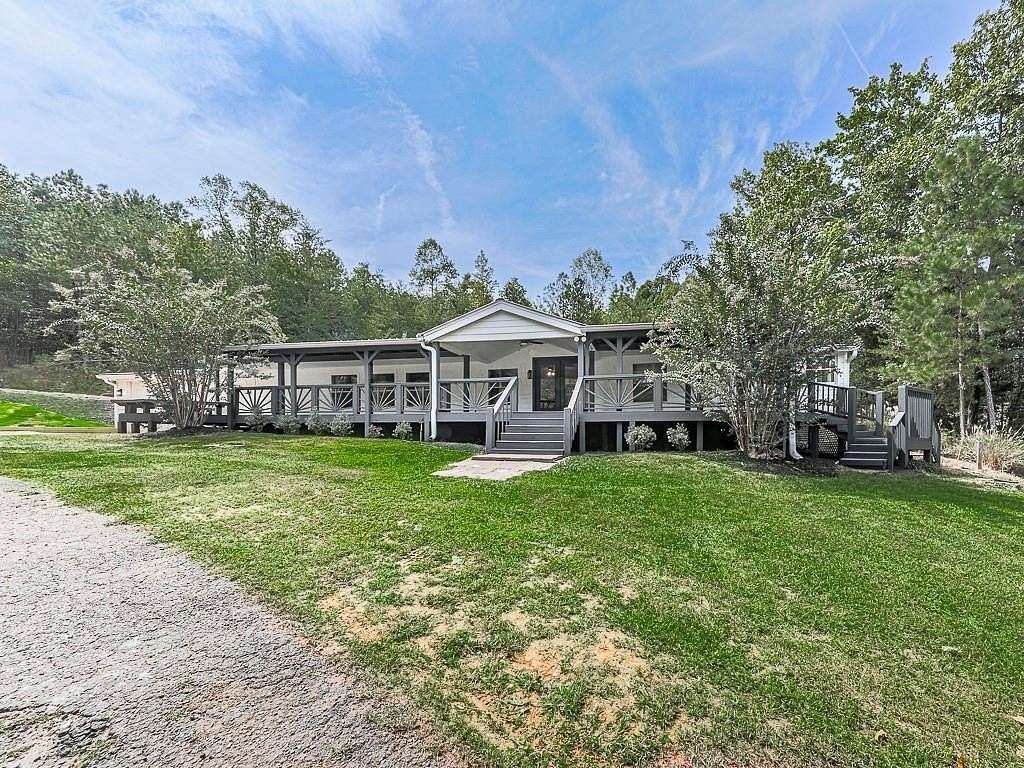 17.53 Acres of Land with Home for Sale in Canton, Georgia