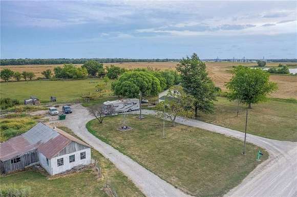 10.3 Acres of Land with Home for Sale in Garden City, Missouri