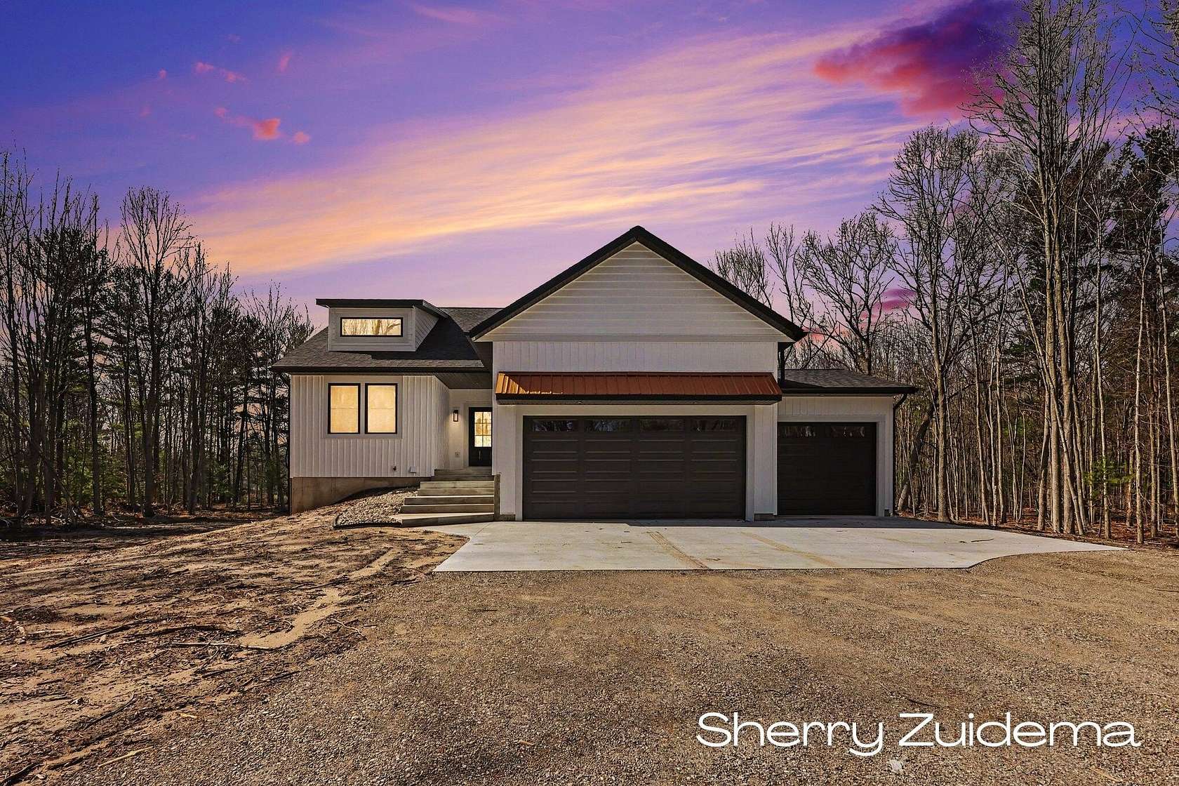 6.8 Acres of Land with Home for Sale in Spring Lake, Michigan