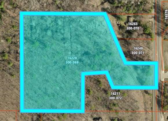 6.81 Acres of Residential Land with Home for Sale in Spring Lake, Michigan