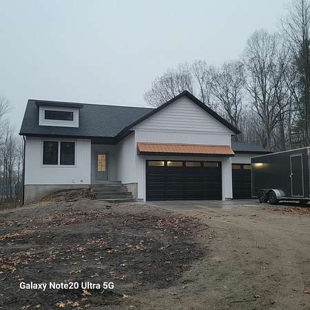 6.8 Acres of Residential Land with Home for Sale in Spring Lake, Michigan