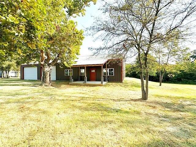 0.7 Acres of Residential Land with Home for Sale in Eufaula, Oklahoma