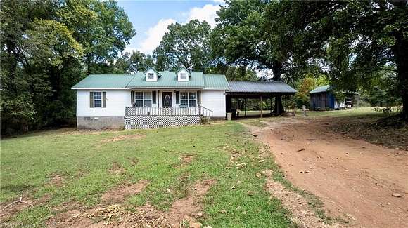 5 Acres of Residential Land with Home for Sale in Muldrow, Oklahoma