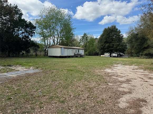 2.36 Acres of Residential Land with Home for Sale in Ocklawaha, Florida