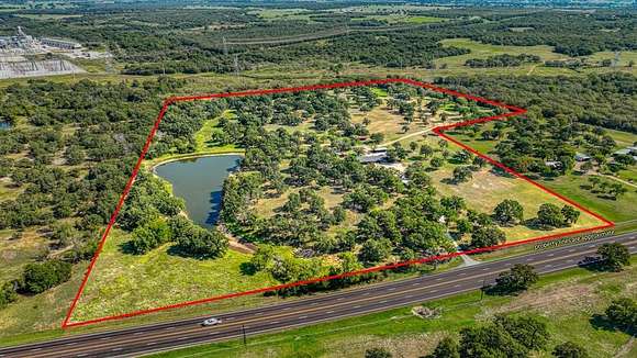 33.34 Acres of Agricultural Land with Home for Sale in Poolville, Texas