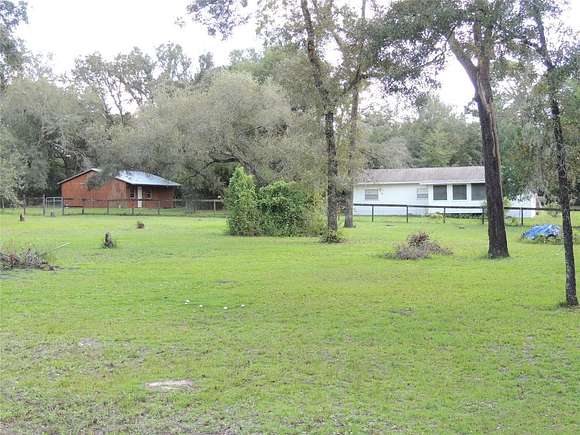 5.15 Acres of Land with Home for Sale in Bronson, Florida