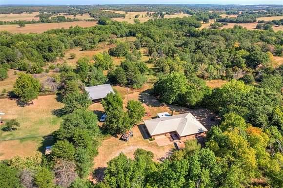 8.24 Acres of Residential Land with Home for Sale in Wellston, Oklahoma