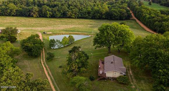 73 Acres of Land with Home for Sale in Southwest City, Missouri