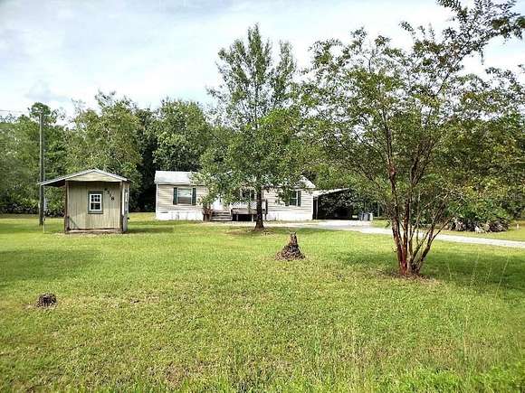 4.31 Acres of Residential Land with Home for Sale in Bunnell, Florida