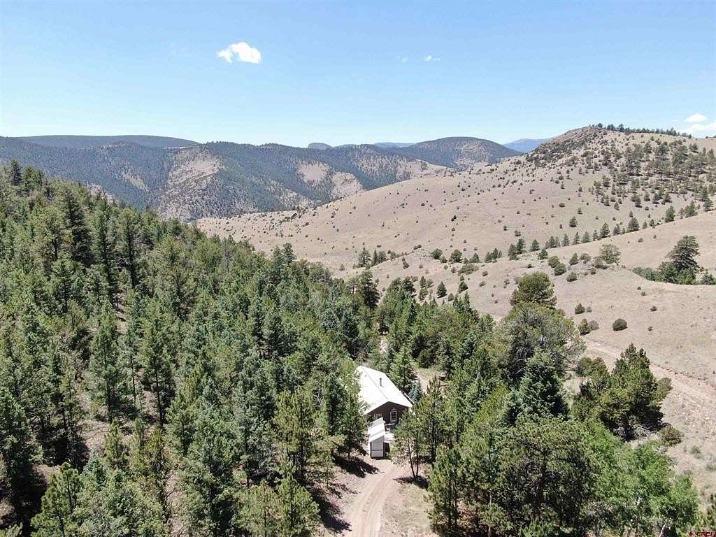 85 Acres of Recreational Land with Home for Sale in Del Norte, Colorado