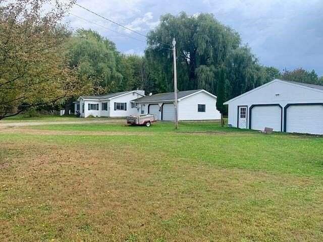 10 Acres of Residential Land with Home for Sale in Alanson, Michigan