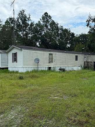 10.1 Acres of Land with Home for Sale in Bronson, Florida