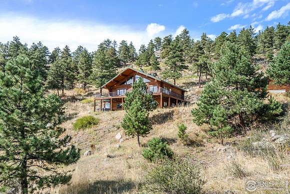 65 Acres of Recreational Land with Home for Sale in Loveland, Colorado