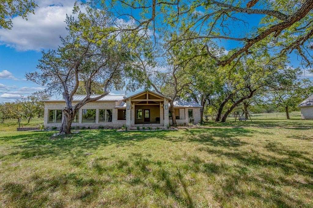 138 Acres of Agricultural Land with Home for Sale in Center Point, Texas