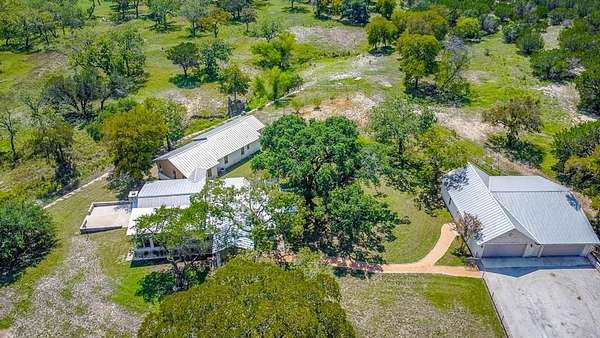138 Acres of Land with Home for Sale in Center Point, Texas