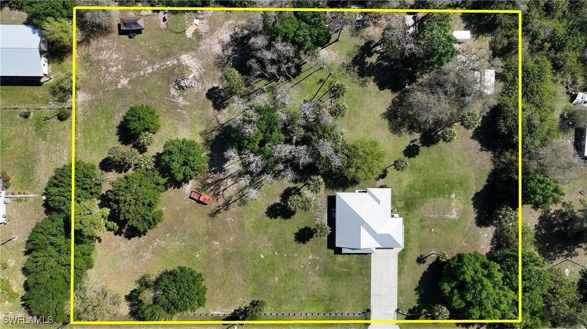 2.26 Acres of Residential Land with Home for Sale in Fort Denaud, Florida