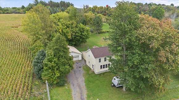 25.38 Acres of Recreational Land with Home for Sale in Rose, New York