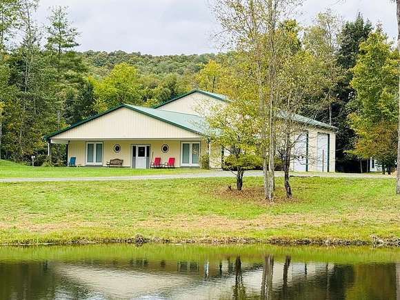 10 Acres of Recreational Land with Home for Sale in Rome, Pennsylvania