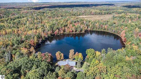 83 Acres of Land with Home for Sale in Long Lake, Michigan