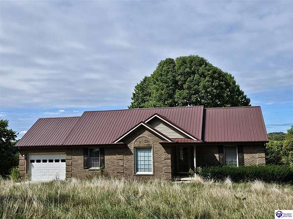 3.8 Acres of Residential Land with Home for Auction in Custer, Kentucky