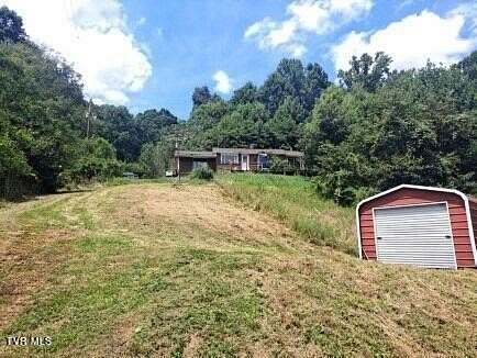 2.5 Acres of Residential Land with Home for Sale in Roan Mountain, Tennessee