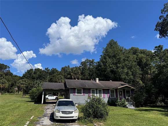 6.3 Acres of Residential Land with Home for Sale in Ocklawaha, Florida