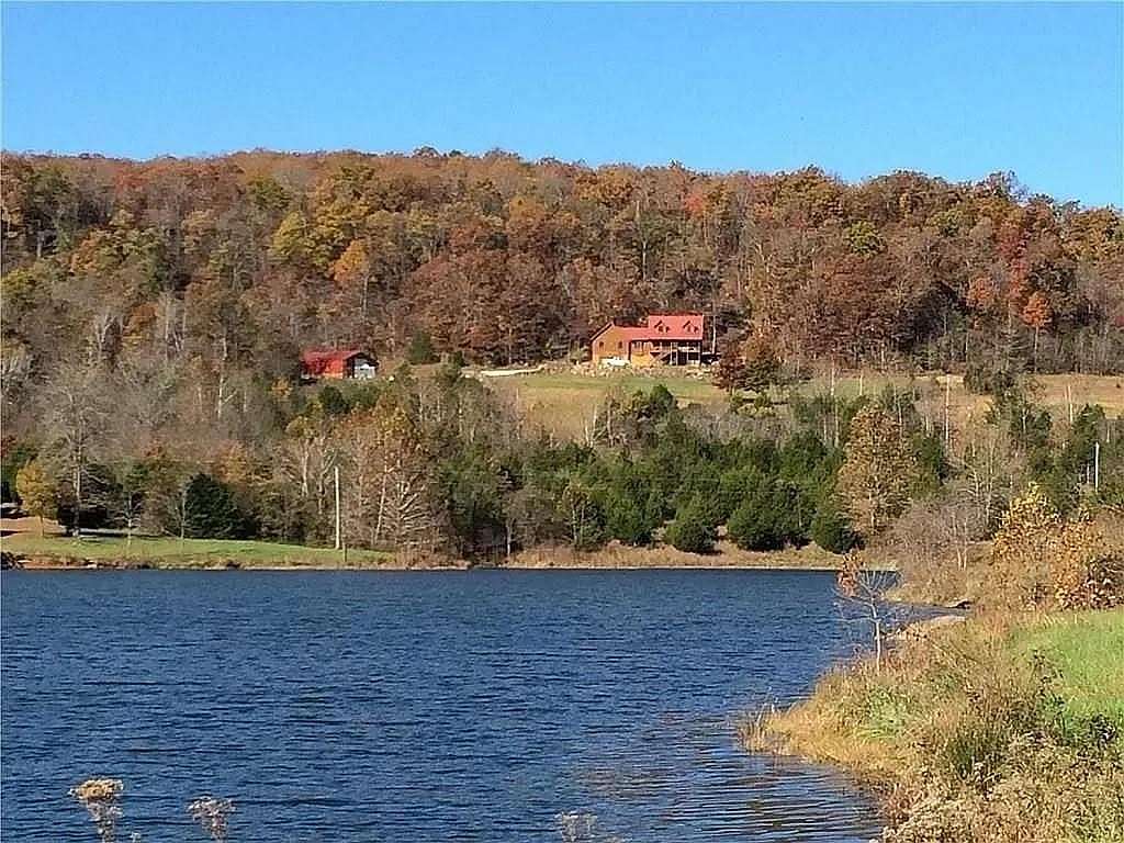 11.253 Acres of Recreational Land with Home for Sale in Huntsville, Arkansas