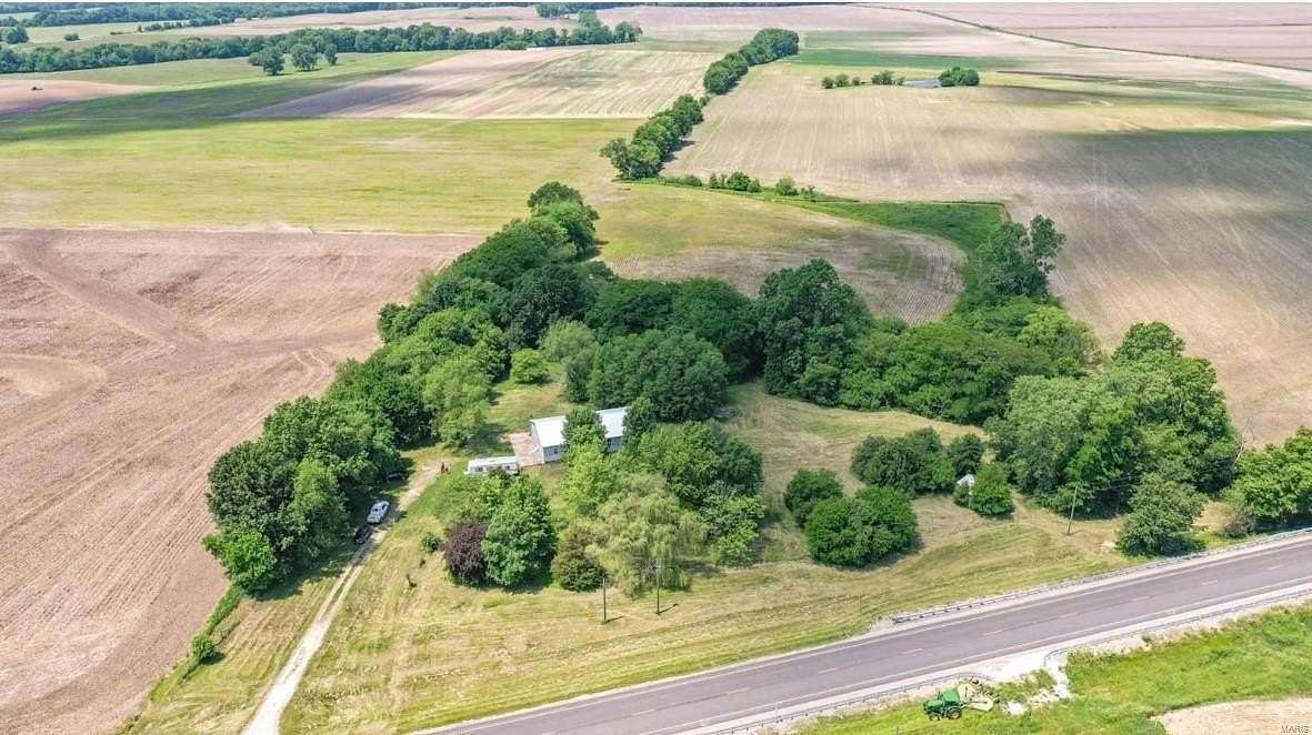 9.95 Acres of Residential Land with Home for Sale in Medora, Illinois