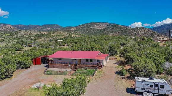 15 Acres of Recreational Land with Home for Sale in La Luz, New Mexico