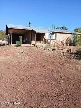 3.36 Acres of Residential Land with Home for Sale in Show Low, Arizona