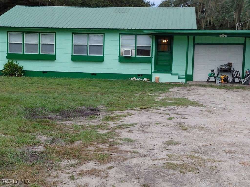 5.5 Acres of Residential Land with Home for Sale in Clewiston, Florida